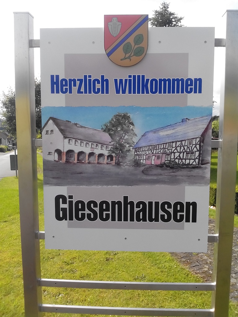 Ortsschild “Herzlich Willkommen in Giesenhausen”